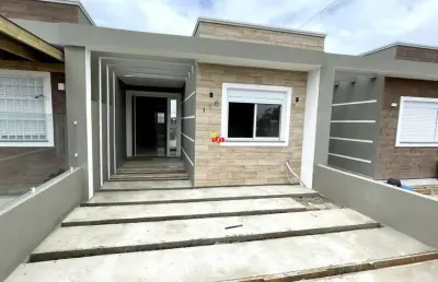 Geminada de 02 dormitórios, em ótima localização na praia de tramandaí, zona nova!