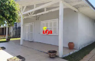 Sobrado à venda em marisul, imbé - piscina, pátio fechado e 5 dormitórios- imperdível!