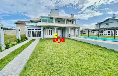 Excelente casa de 4 quartos, próximo ao mar em tramandaí, zona nova!