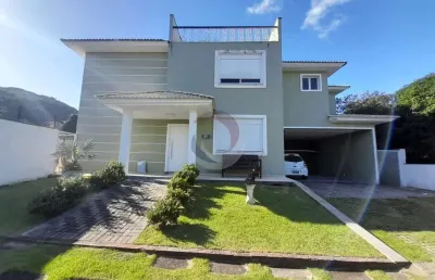 Casa em condomínio fechado com 3 quartos para alugar na rua da capela, 505, campeche, florianópolis por r$ 14.000