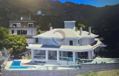 Casa em condomínio fechado com 5 quartos para alugar na rodovia haroldo soares glavan, 1670, cacupé, florianópolis por r$ 23.000