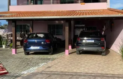 Casa espaçosa em dois terrenos proxima ao mar em penha. oportunidade