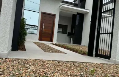 Encantadora residência com conforto, elegância e conveniência!