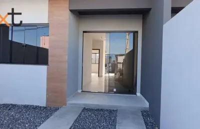 Casa geminada moderna em navegantes: conforto e segurança com localização privilegiada!