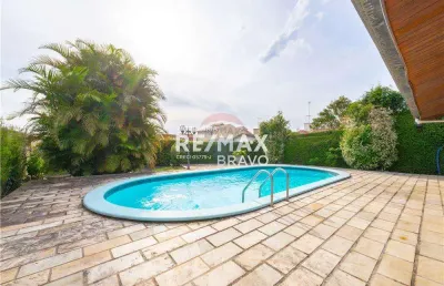 Casa térrea à venda com piscina, 374m2, 5 quartos (2 suítes), 9 vagas de garagem, área gourmet