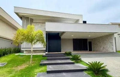 Casa de luxo com 4 suítes, piscina e acabamento premium no portal do sol green