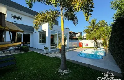 Casa com 4 quartos à venda na rua dos cumurupis, 121, jurerê internacional, florianópolis por r$ 4.950.000