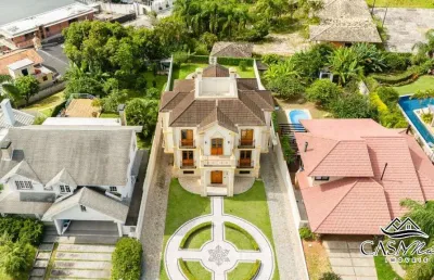 Casa em condomínio fechado com 3 quartos à venda na rodovia haroldo soares glavan, 3522, cacupé, florianópolis por r$ 5.500.000