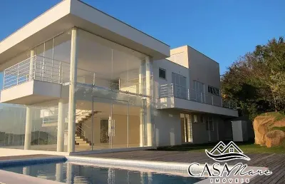 Casa em condomínio fechado com 3 quartos à venda na rodovia haroldo soares glavan, 4000, cacupé, florianópolis por r$ 6.500.000