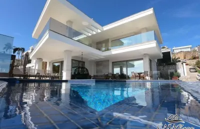 Casa em condomínio fechado com 5 quartos à venda na estrada haroldo soares glavan, 18, cacupé, florianópolis por r$ 15.900.000