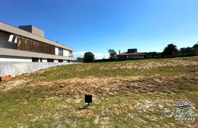 Terreno em condomínio fechado à venda na rodovia haroldo soares glavan, 1710, cacupé, florianópolis por r$ 3.400.000