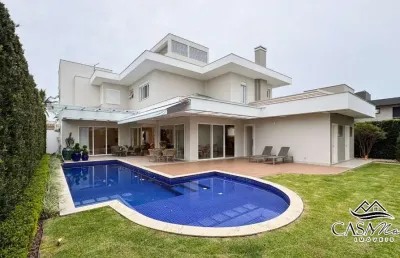 Casa com 4 quartos à venda na avenida dos dourados, 210, jurerê internacional, florianópolis por r$ 8.200.000