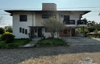 Casa em condomínio fechado com 6 quartos à venda na rodovia haroldo soares glavan, 1950, cacupé, florianópolis por r$ 2.199.000