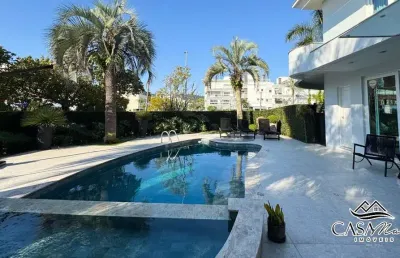 Casa com 4 quartos à venda na avenida dos dourados, 626, jurerê internacional, florianópolis por r$ 6.200.000