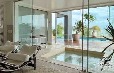 Casa em condomínio fechado com 6 quartos à venda na estrada haroldo soares glavan, 4450, cacupé, florianópolis por r$ 18.000.000