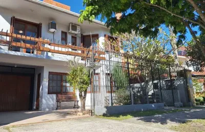 Casa com 4 quartos à venda na professor carlos henrique nogueira, 621, centro, pelotas por r$ 850.000