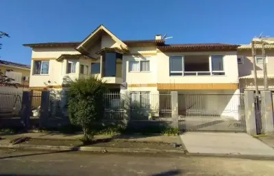 Casa com 3 quartos à venda na Rua Lagoa do Peixe, 130, Sarandi, Porto Alegre