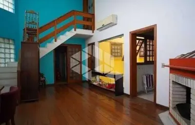 Casa com 3 quartos à venda na Rua Roque Calage, 382, Passo da Areia, Porto Alegre