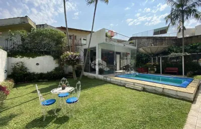 Casa com 5 quartos à venda na Rua Estácio de Sá, 332, Chácara das Pedras, Porto Alegre