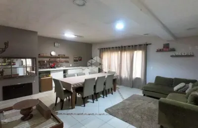 Casa 3 dormitórios com suíte vagas de garagem no bairro passo da areia.