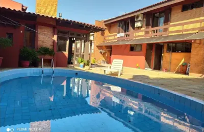 Casa com 4 quartos à venda na Rua Professor Fernando Carneiro, 287, Três Figueiras, Porto Alegre