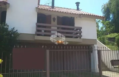 Casa 4 dormitórios com vaga de garagem no bairro jardim lindóia.