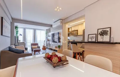 Apartamento com três quartos, duas vagas e churrasqueira