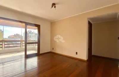 Apartamento 03 quartos com suíte, sacada integrada com churrasqueira em rua tranquila.