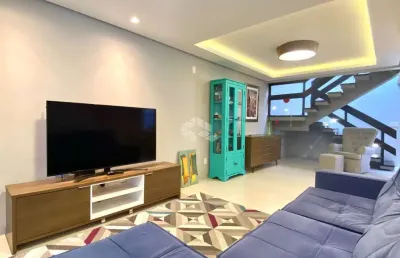 Casa  sobrado a venda com 3 dormitórios, sendo 2 suites, sala de estar e sala de jantas cozinha com armários, área de serviço com armários  e garage