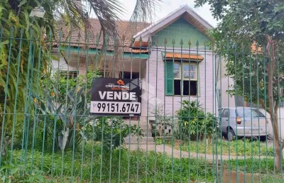 Casa em terreno plano de 400 m² a venda no bairro jardim itú - porto alegre/rs