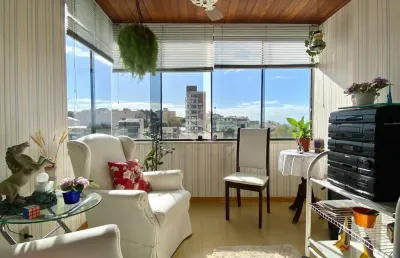 Cobertura a venda com 3 dormitórios, 2 banheiros, sala de jantar, sala de estar, sacada, churrasqueira, banheiro, área de serviço e vaga garagem