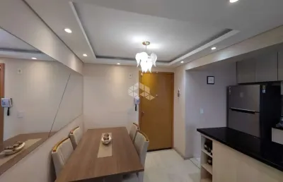 Apartamento de 2 quartos com churrasqueira e vaga de garagem