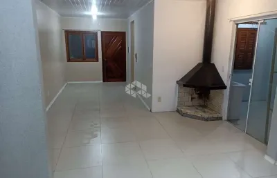 Casa a venda em condomínio com 2 dormitórios, sala , cozinha, banheiro, garagem