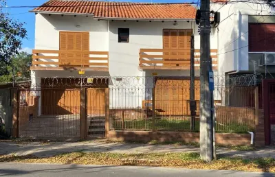 Casa com 3 quartos à venda na Rua Bogotá, 515, Jardim Lindóia, Porto Alegre