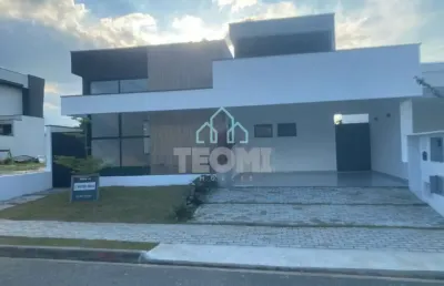 Casa com 3 dormitórios sendo 3 suítes à venda, 169 m² por r$ 1.310.000 - condomínio ouro ville - ta
