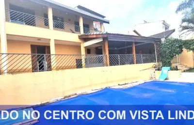 Exuberante vista e excelente localização - casa com 3 dormitórios à venda, 260m² por r$ 1.200.000 - centro - atibaia/sp