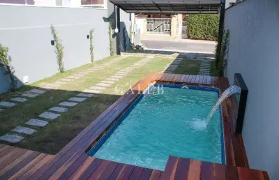 Casa térrea à venda com 3 suítes, piscina, quintal com gramado