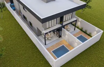 Sobrado à venda com 3 suítes, piscina e 186m² de área construída