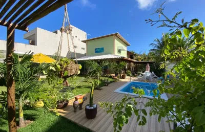 Linda casa  3 dormitórios em condomínio pé na areia
