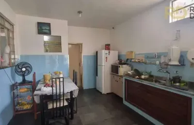 Terreno a venda no santa efigênia com casa e barrações para aluguel