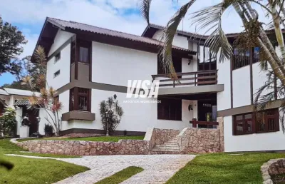 Casa em condomínio fechado com 4 quartos à venda na rodovia haroldo soares glavan, 1900, cacupé, florianópolis por r$ 2.900.000