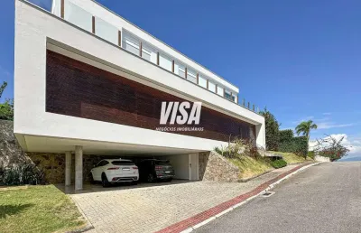 Casa em condomínio fechado com 4 quartos à venda na rodovia haroldo soares glavan, 3950, cacupé, florianópolis por r$ 6.980.000