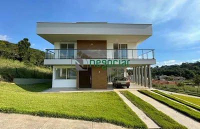 Viva o luxo e a exclusividade: residência de alto padrão em condomínio requintado!