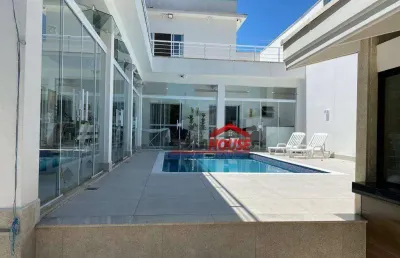 Casa com 4 dormitórios à venda, 393 m² por r$ 1.700.000 - centro - caraguatatuba/sp