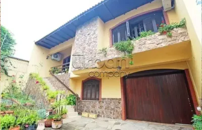 Casa em condomínio fechado com 3 quartos à venda na rua umbú, 137, passo da areia, porto alegre por r$ 1.300.000