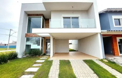 Casa em condomínio fechado com 3 quartos à venda na avenida frederico warstat, 695, sans souci, eldorado do sul por r$ 750.000
