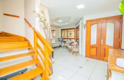 Casa em condomínio fechado com 3 quartos à venda na rua professor isidoro la porta, 58, jardim planalto, porto alegre por r$ 1.299.000
