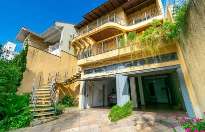 Casa em condomínio fechado com 5 quartos à venda na rua isidoro tressi, 507, jardim botânico, porto alegre por r$ 1.550.000