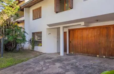 Casa em condomínio fechado com 3 quartos à venda na rua doutor prudente de moraes, 374, chácara das pedras, porto alegre por r$ 1.550.000