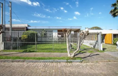Casa em condomínio fechado com 3 quartos à venda na rua coronel armando assis, 134, três figueiras, porto alegre por r$ 1.300.000